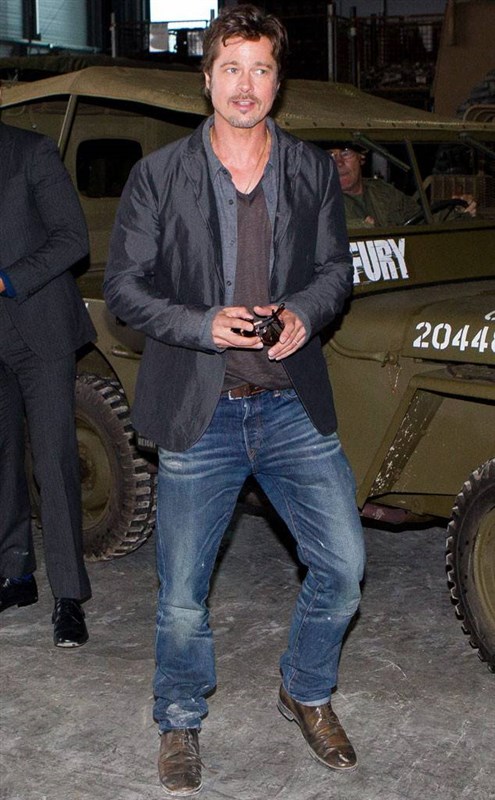 Brad Pitt shows off his wedding ring for the first time after marrying Angelina Jolie